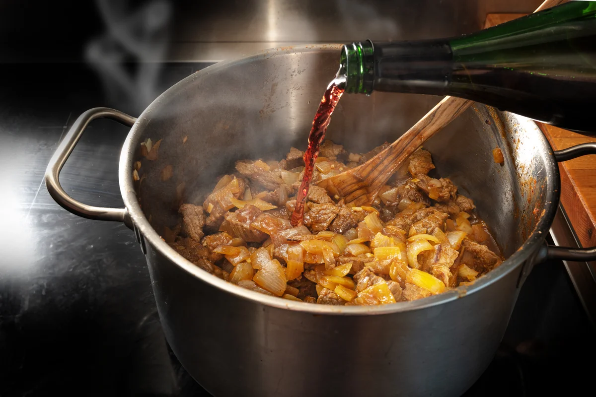 deglazing a pan with wine