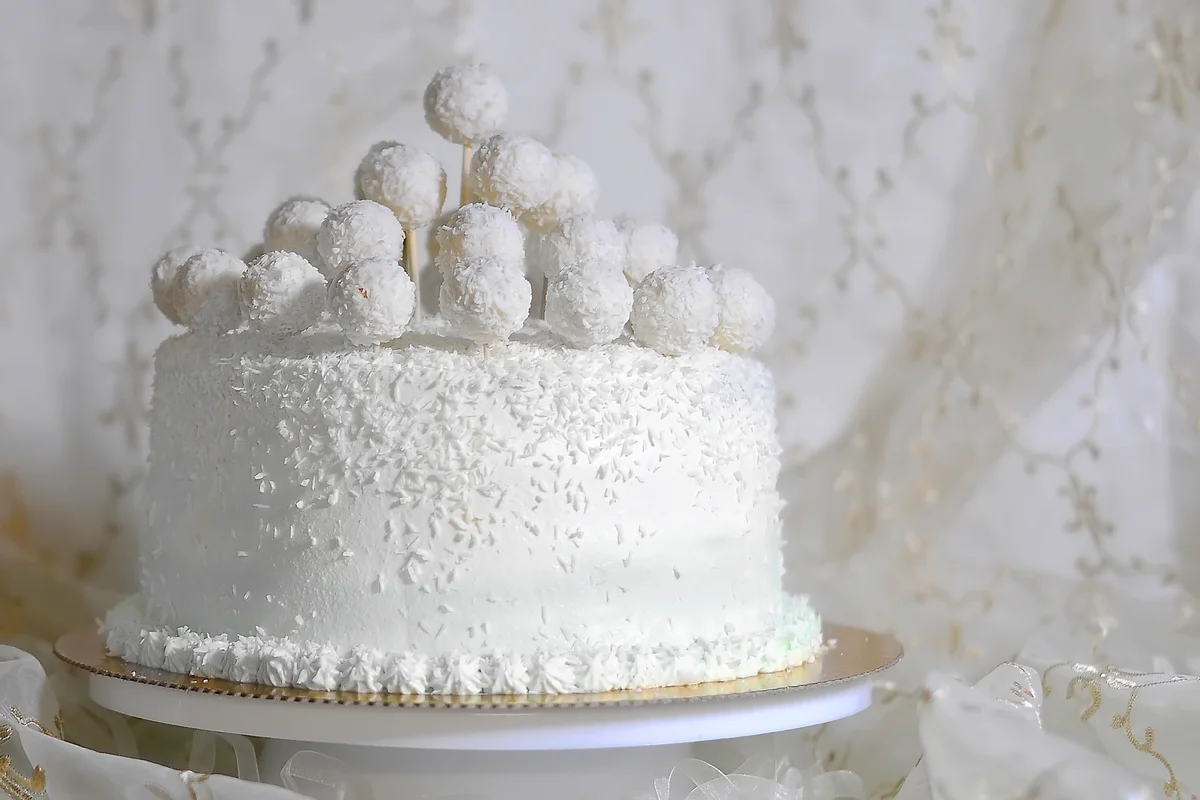 White coconut wedding cake