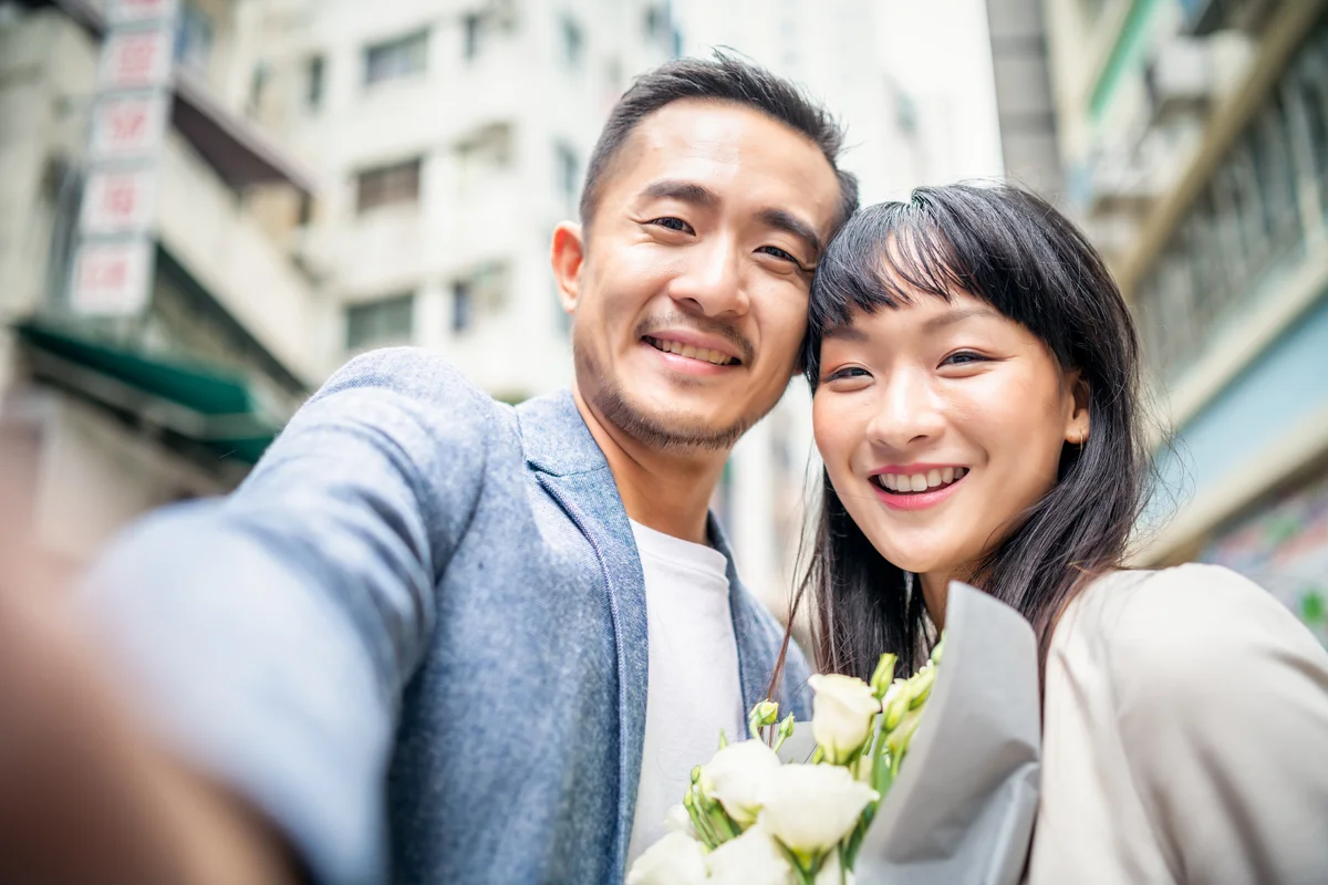 wedding couple taking a selfie