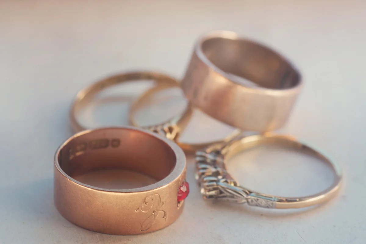 A collection of vintage gold rings