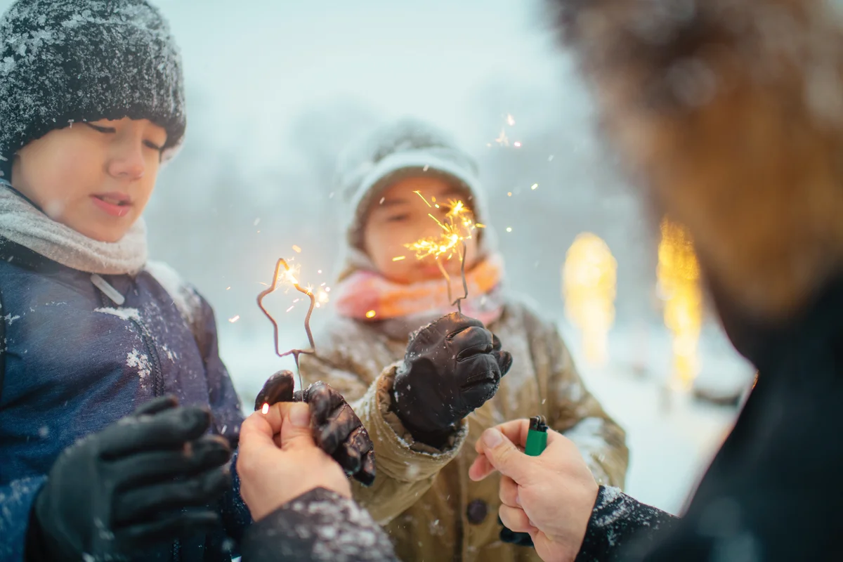 Family at market with sparklers