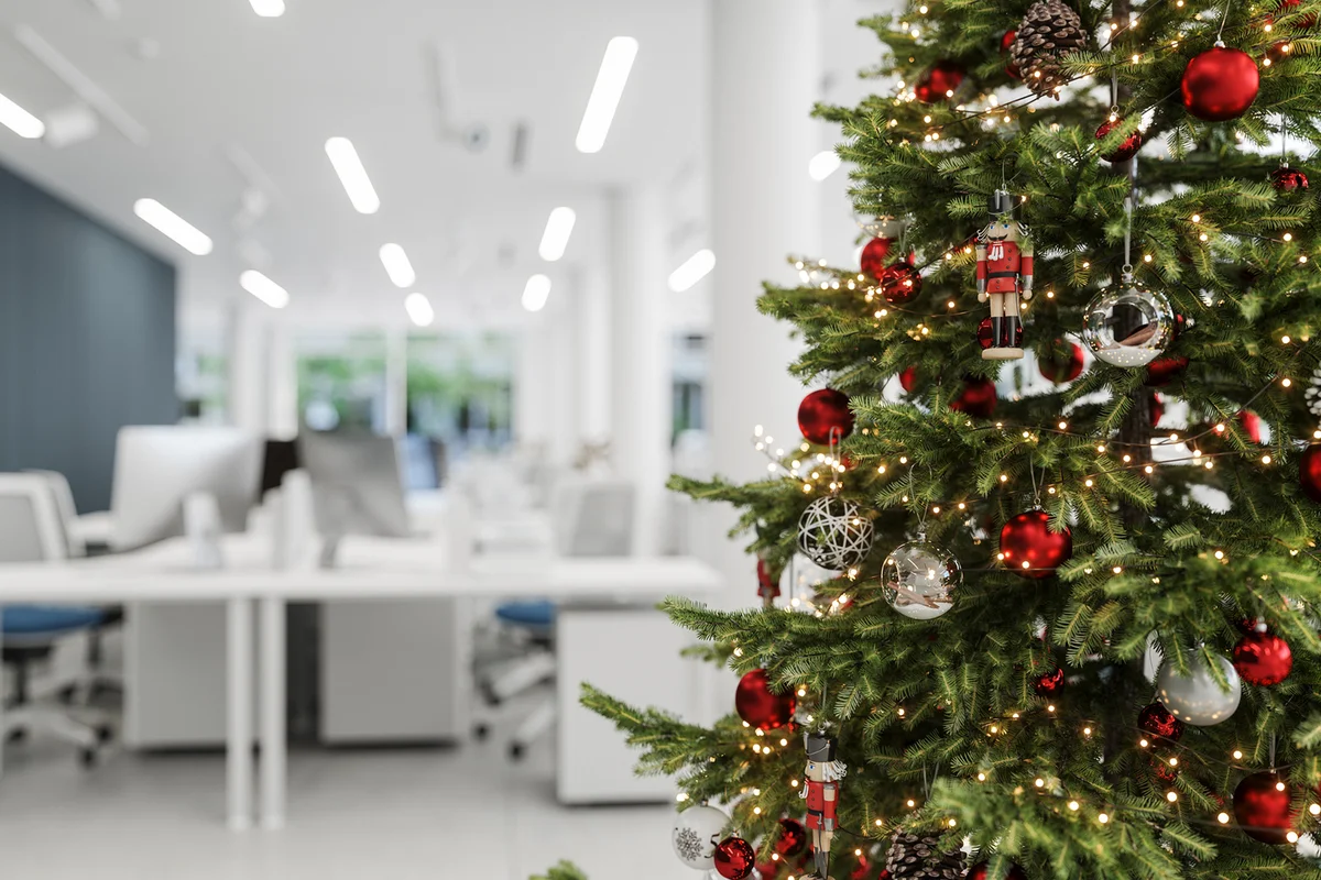 Christmas Tree With Ornaments In The Office