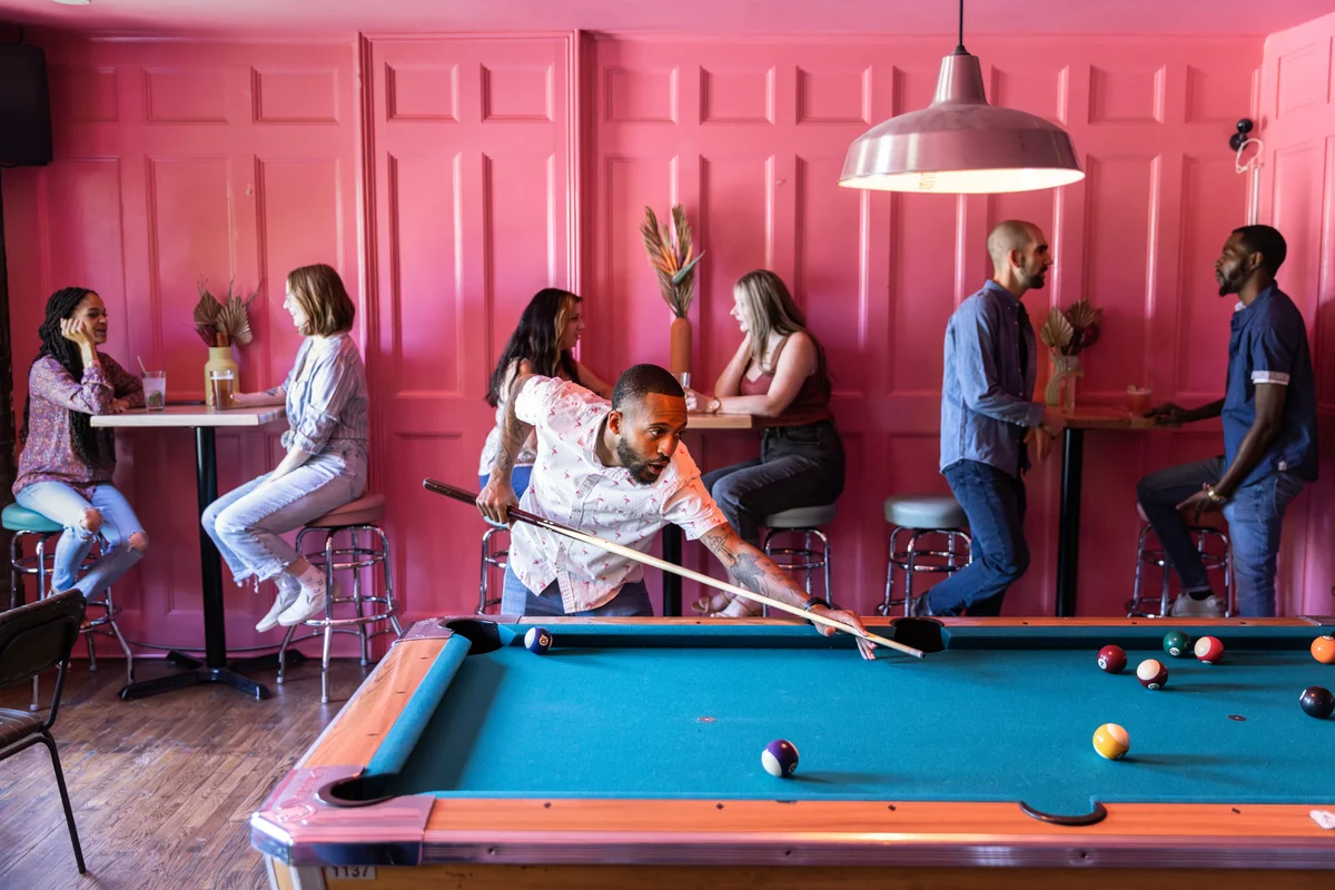 playing pool in a bar