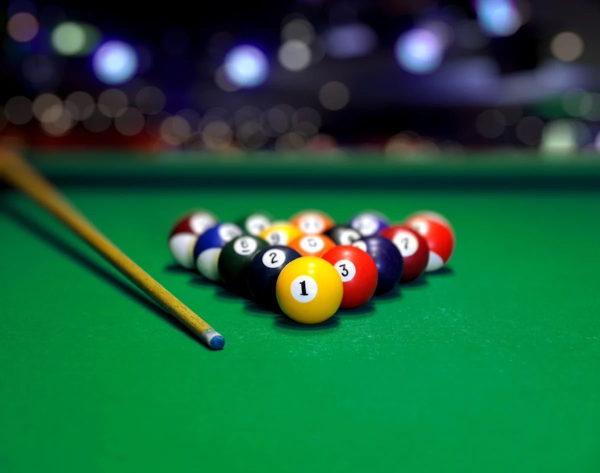 pool balls lined up on a table