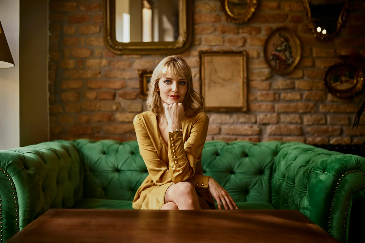 woman on a vintage couch