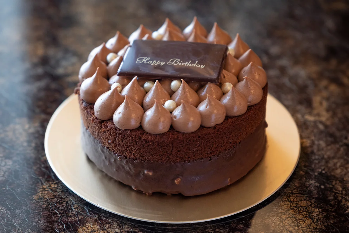 High Angle View Of Chocolate Birthday Cake