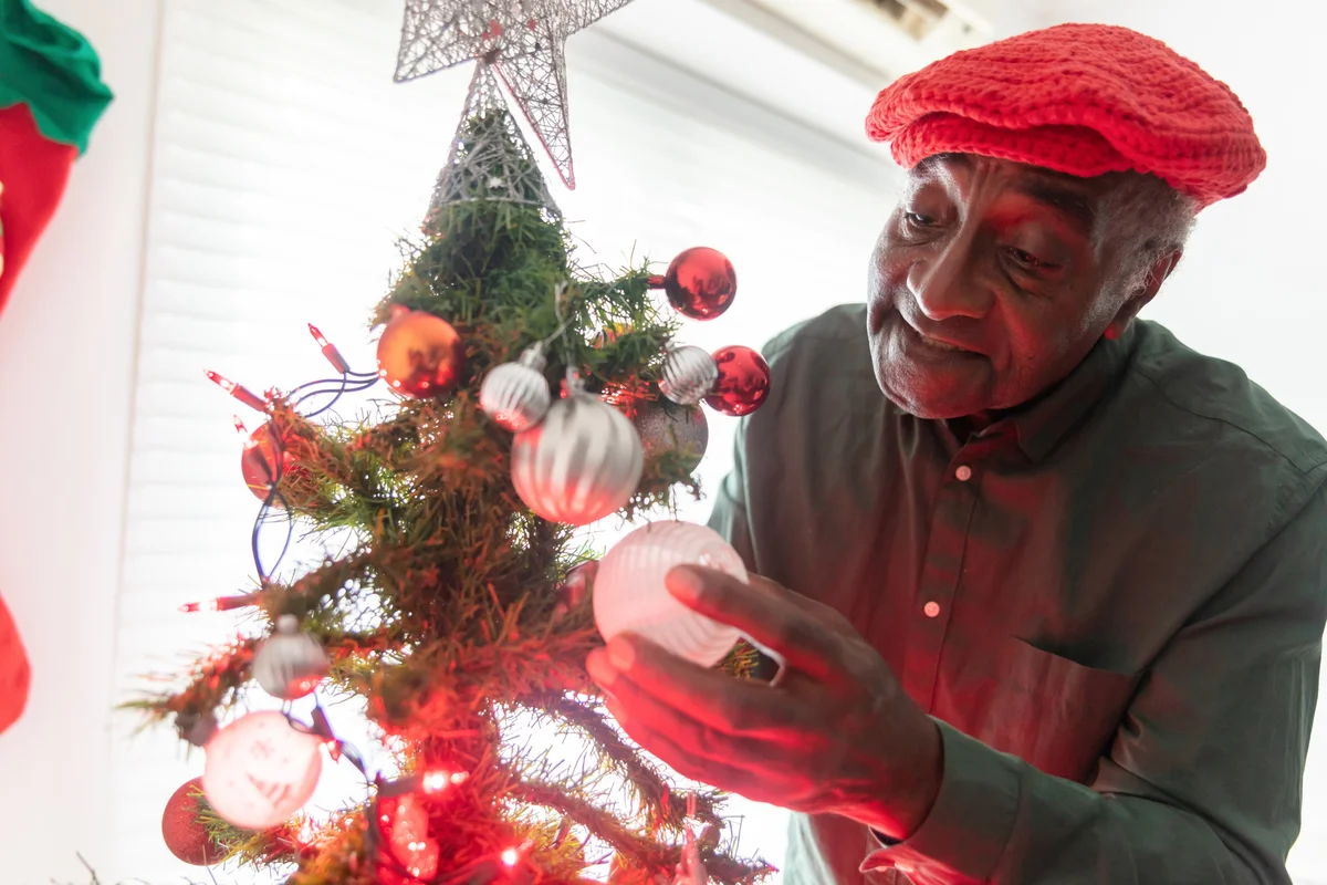 older man decorating