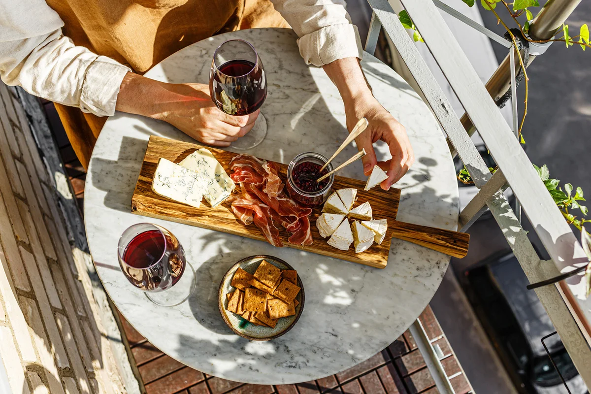 Varied appetizer Cheese board with soft cheese