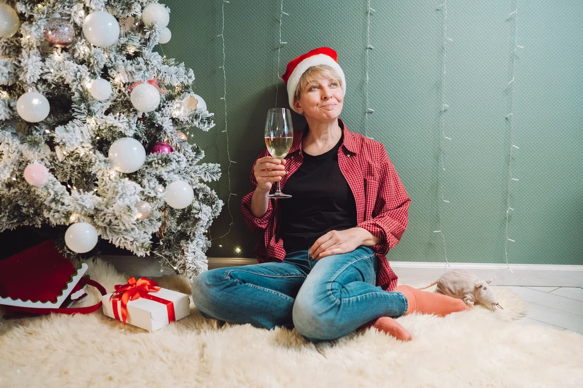 woman drinking wine on NYE