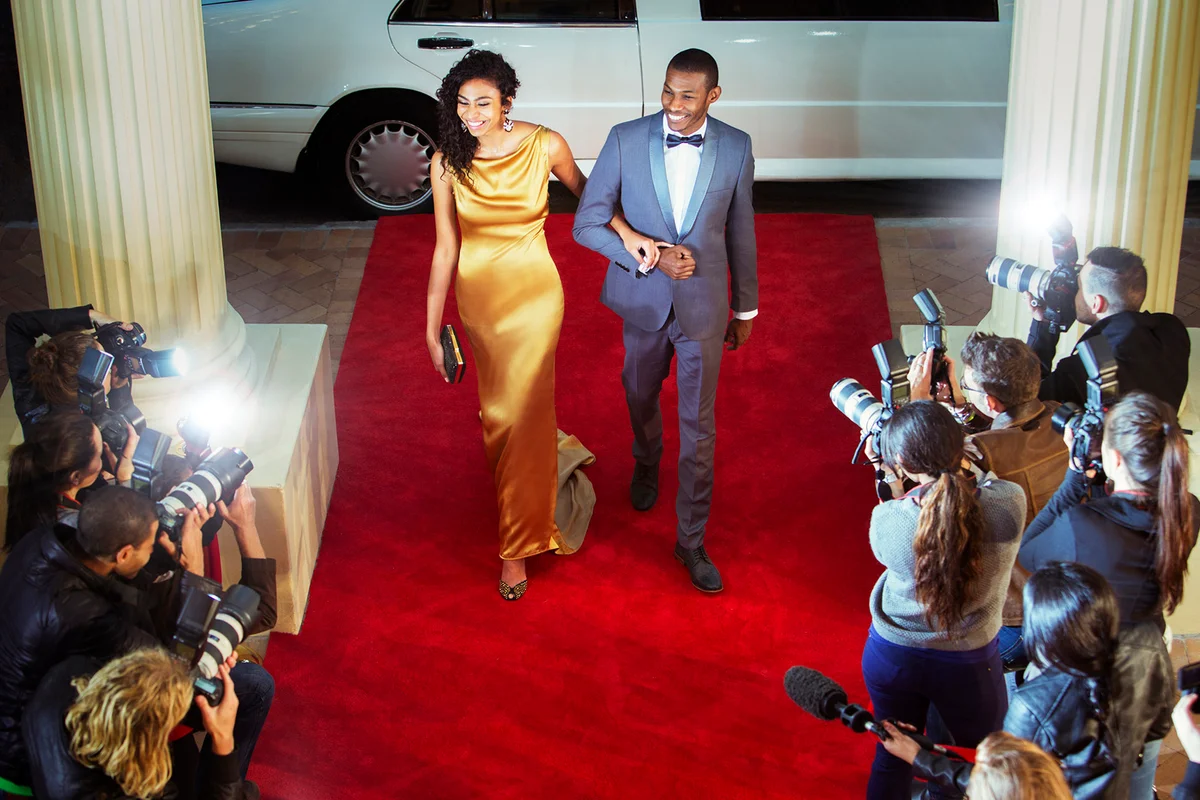 Celebrity couple arriving at red carpet event