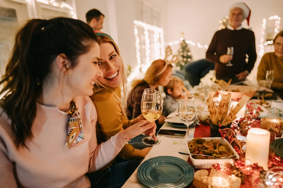family celebrating Christmas at home
