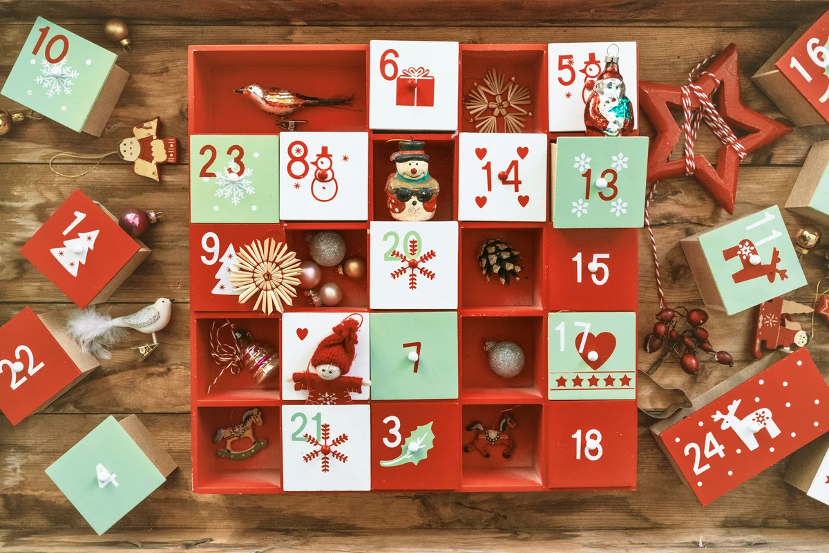 Old wooden advent calendar with vintage decoration