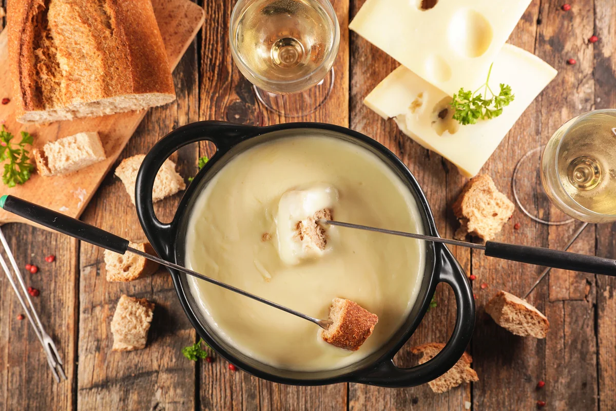 Cheese fondue with bread and wine