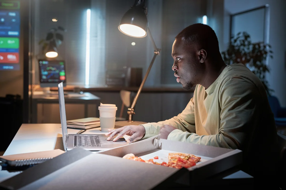 Man working at office during deadline