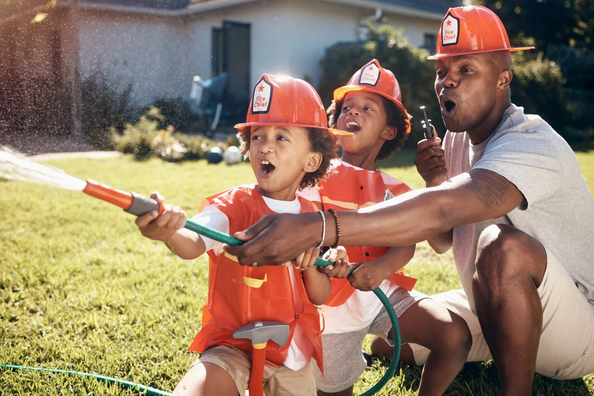 family playing firefighters