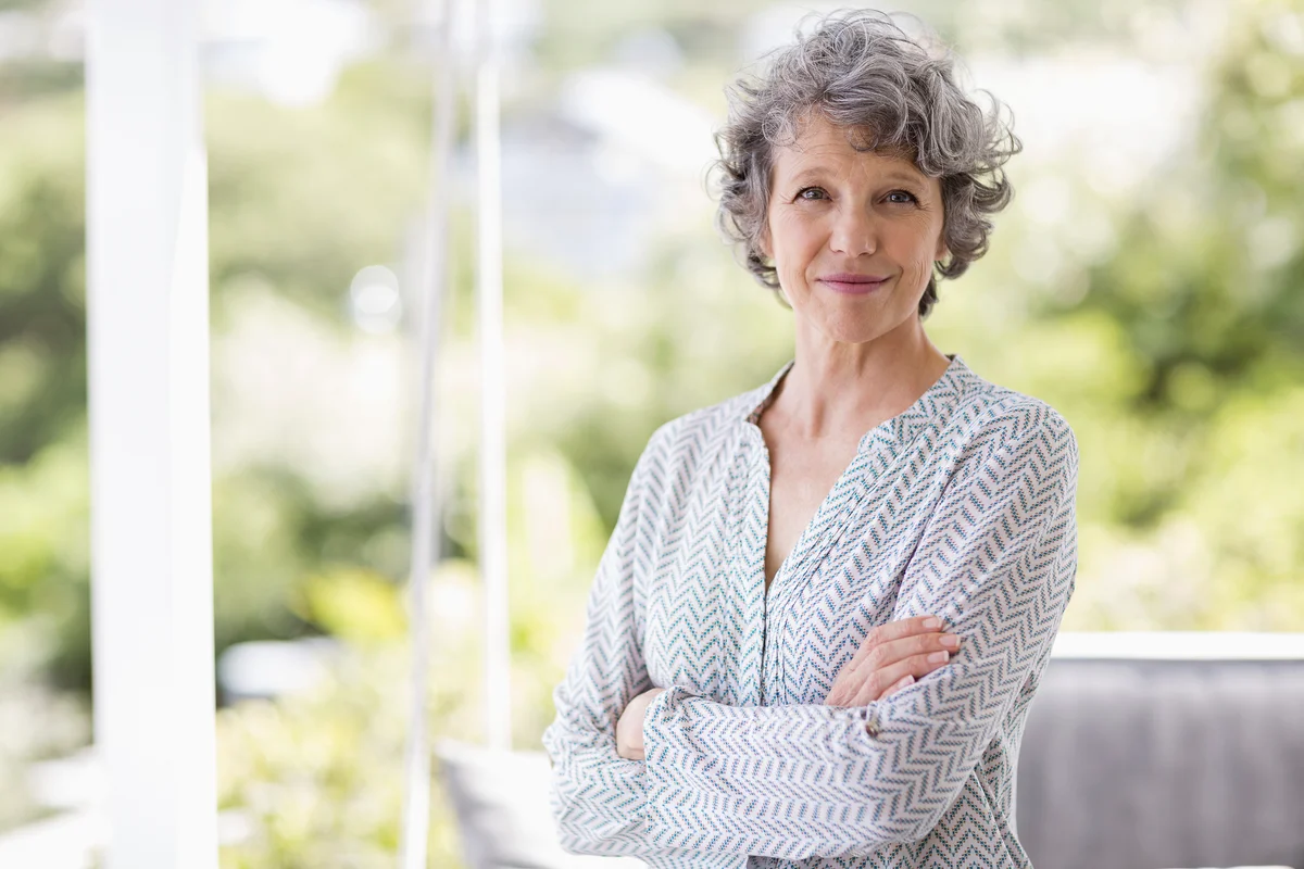 woman with short curly grey hair