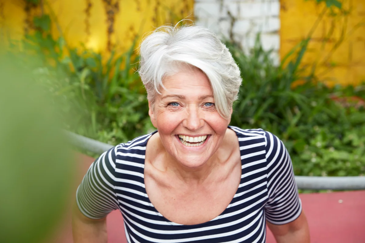 Portrait of happy woman in the garden