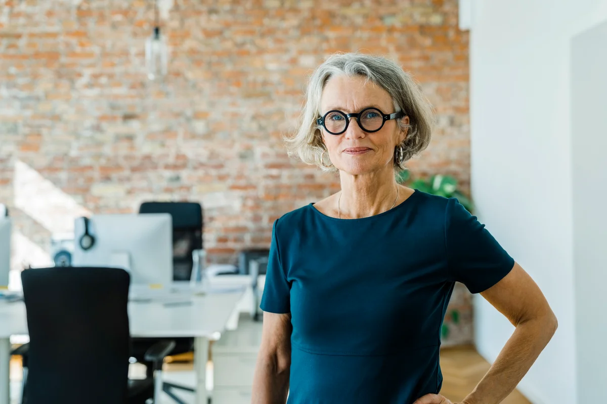 Portrait of a senior businesswoman standing in office