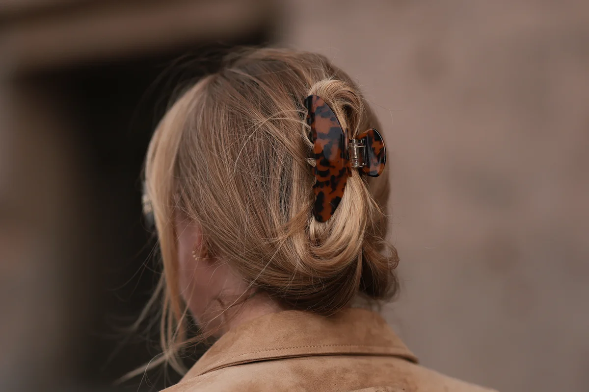 Woman with tortoise hair clip