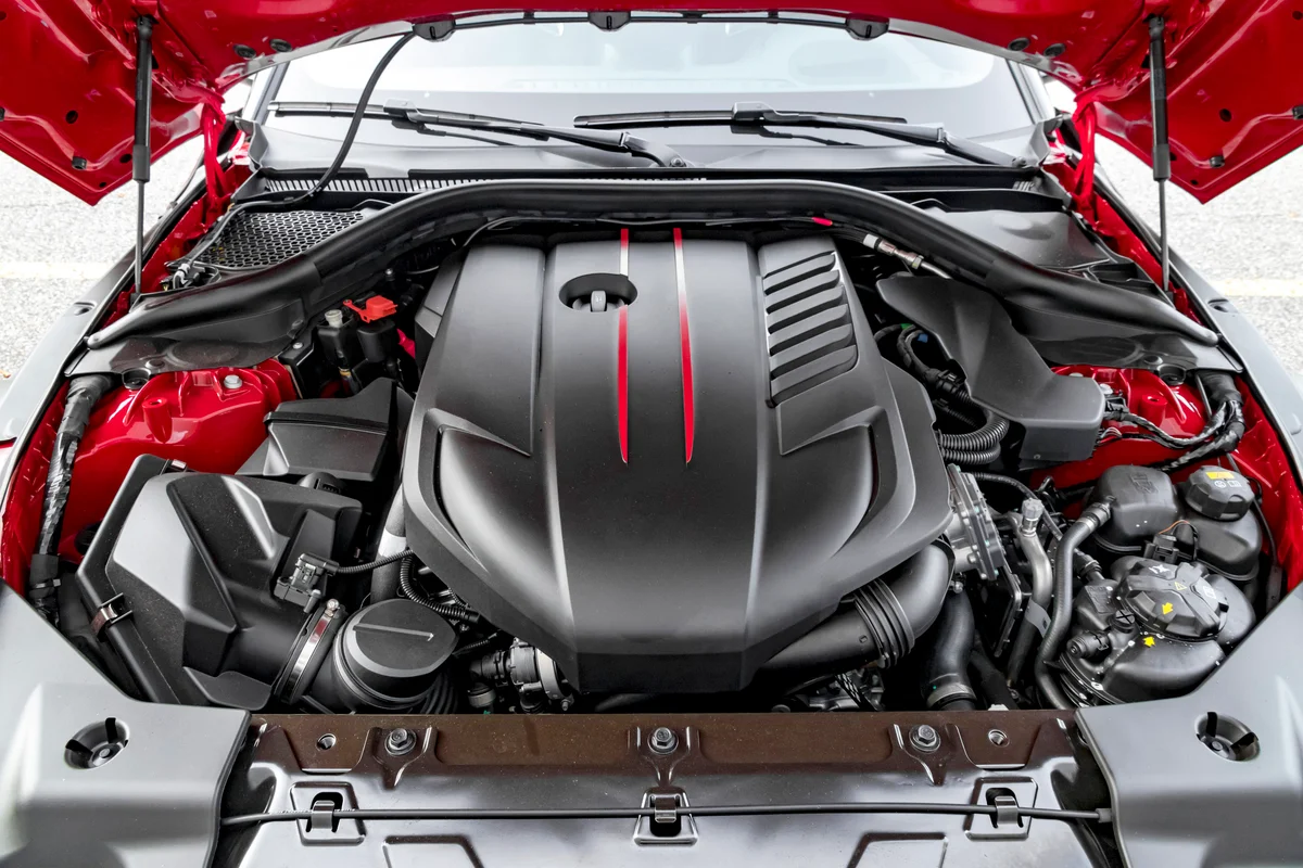 Modern sports car engine under hood