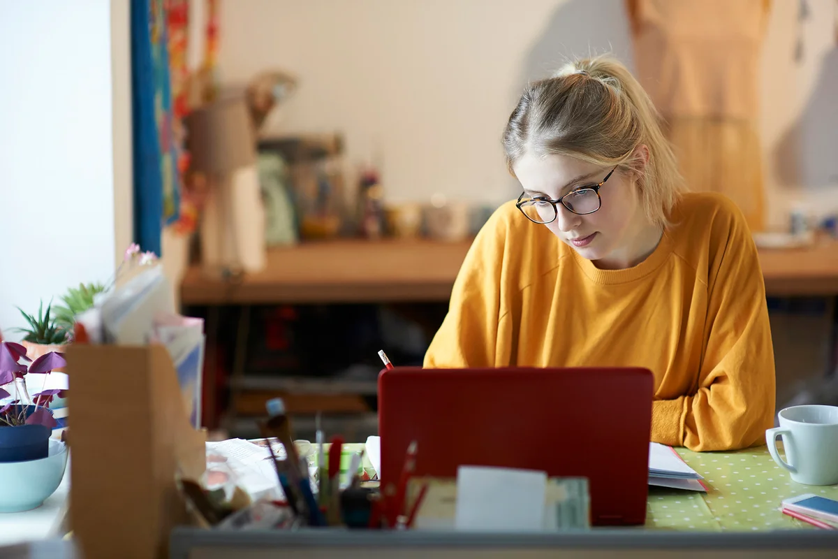 Female student at home studying