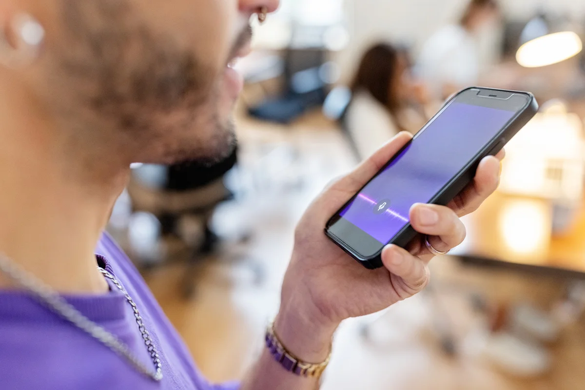 man recording voice message