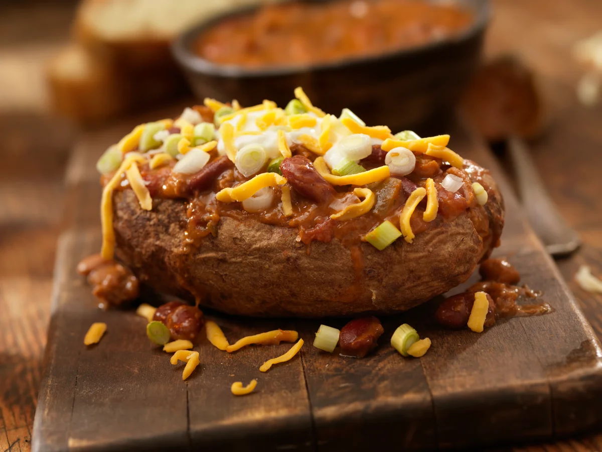 baked potato with chili and cheese