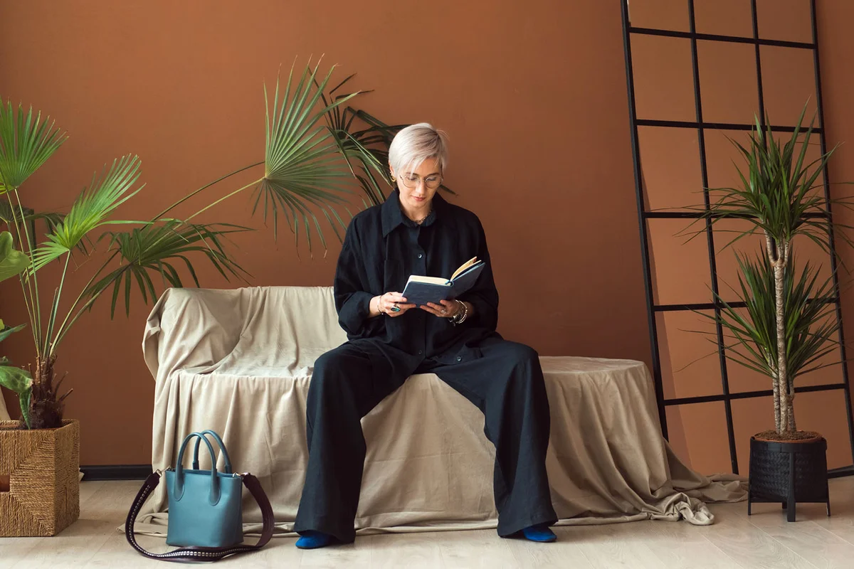 woman in black shirt working in modern work place or office