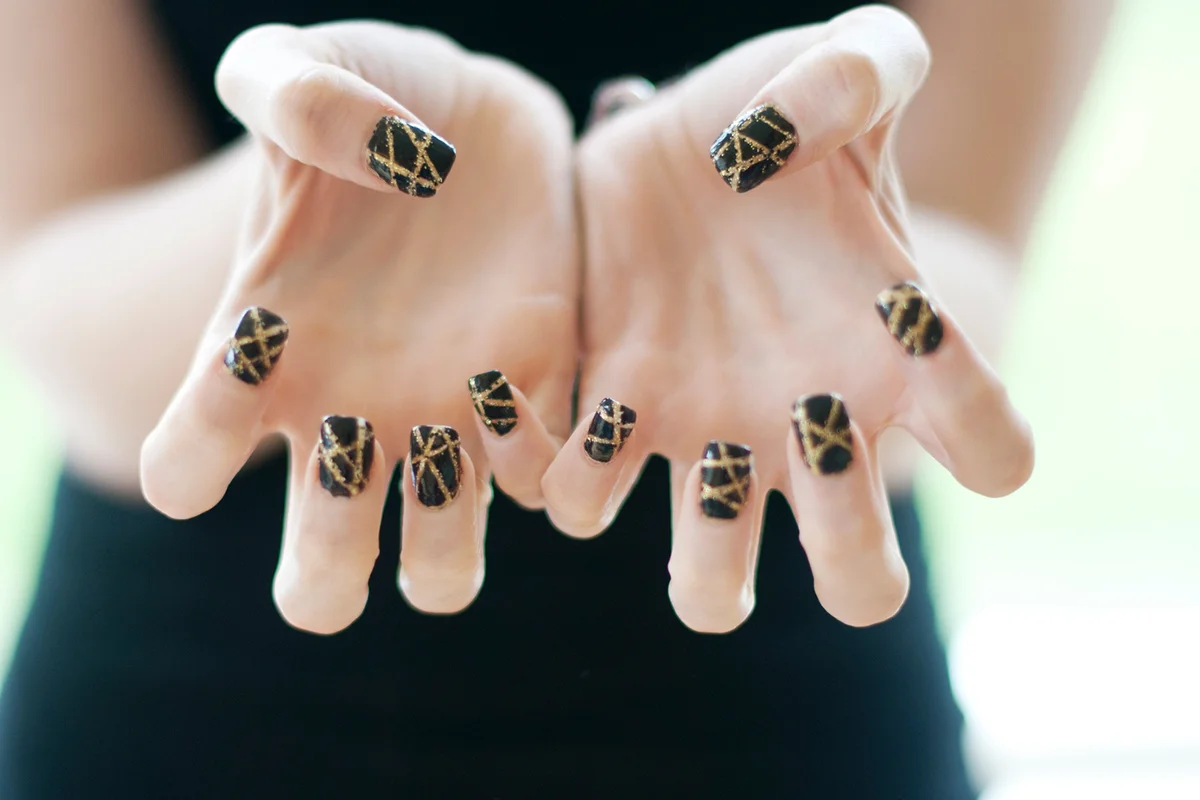 Black and gold custom nail art