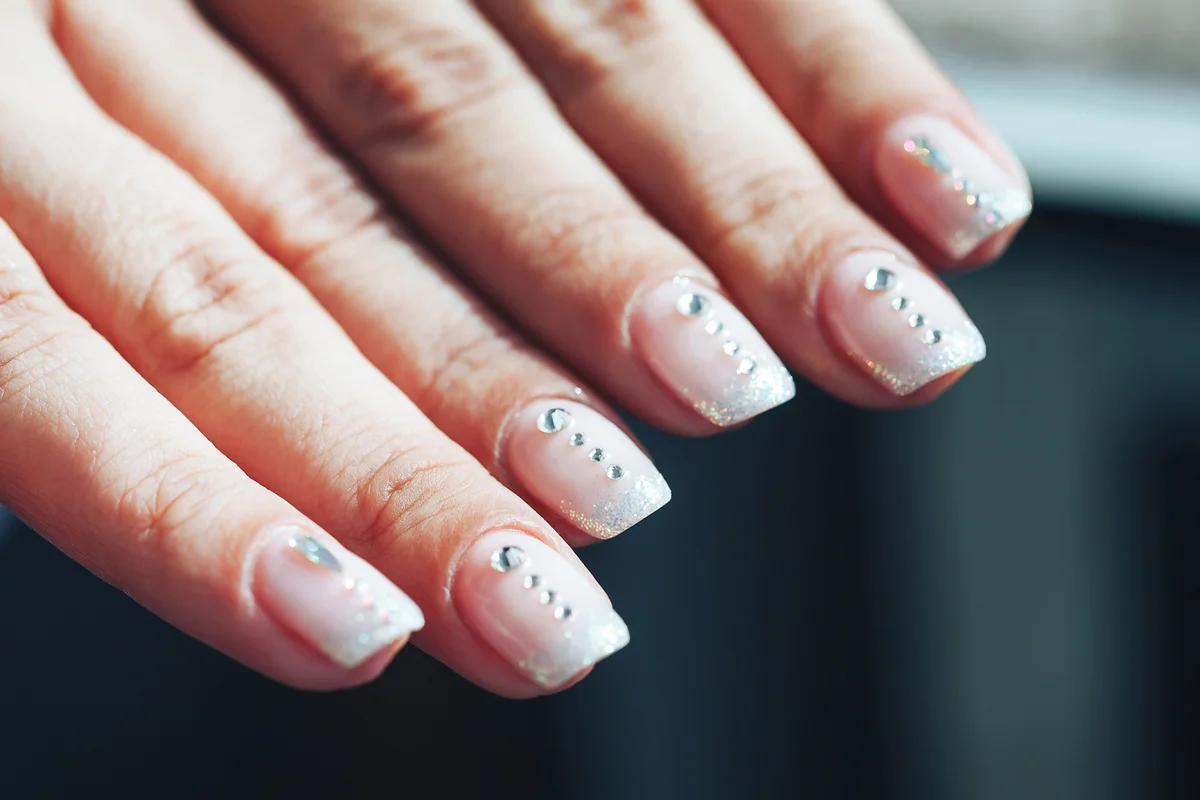 Hands of a Woman with Decorated Nails
