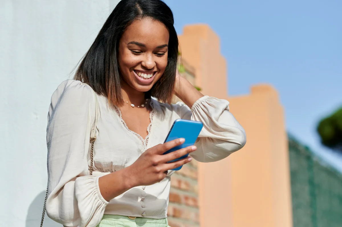 woman with relaxed hair smiling