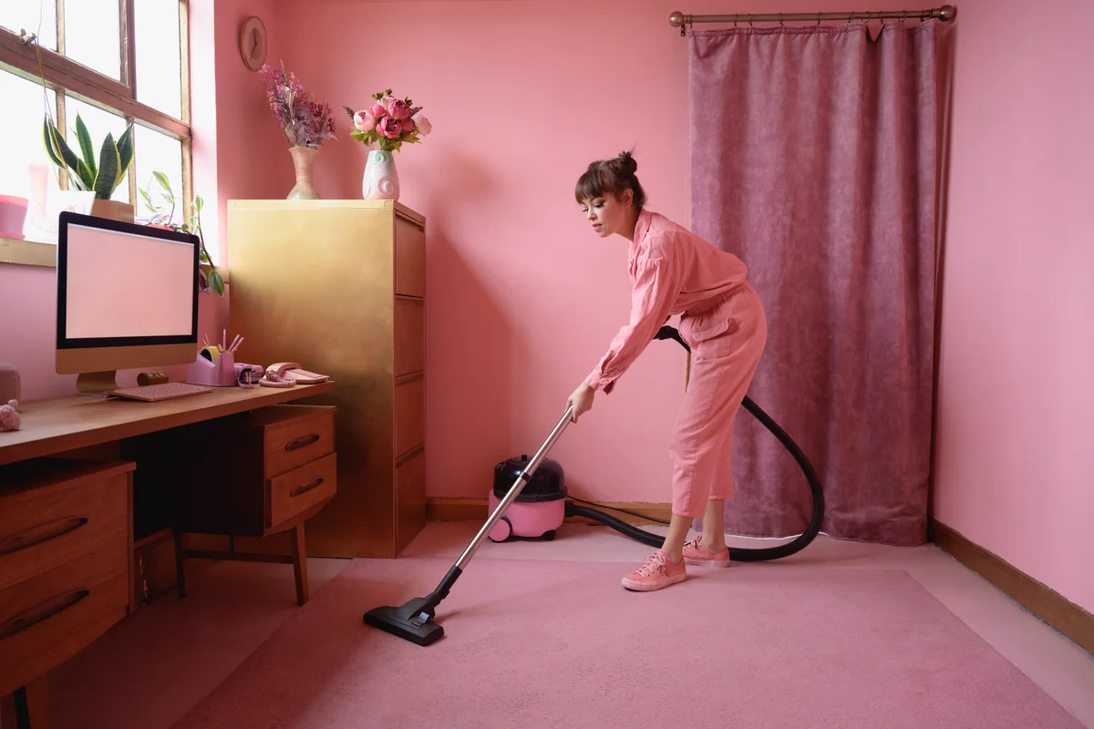 woman cleaning her carpet