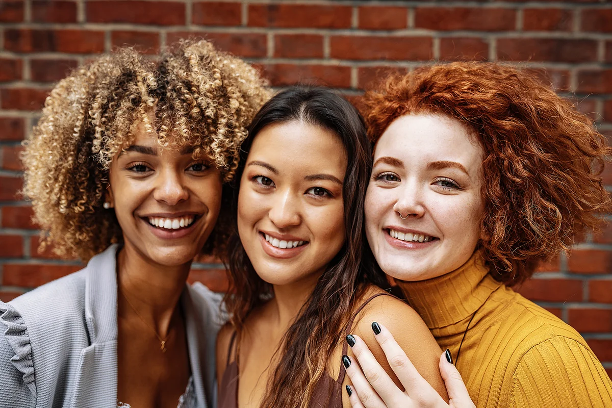 Diverse millennial friends smiling