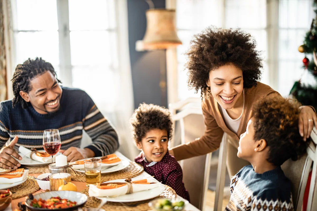 family talking at dinner