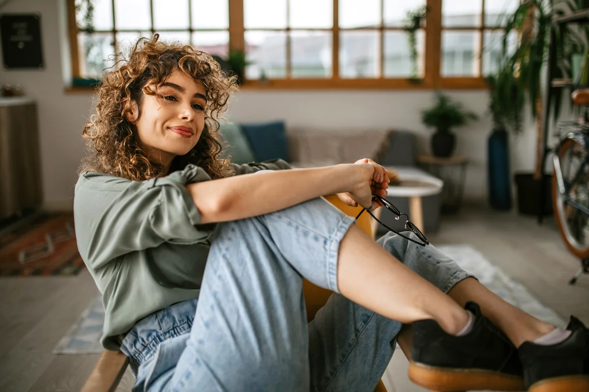 Confident young woman relaxing