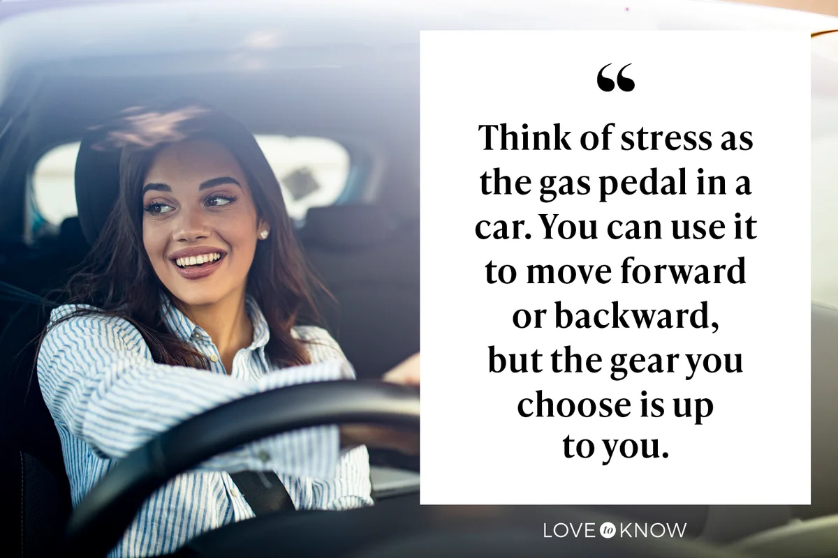 Happy brunette woman driving a car