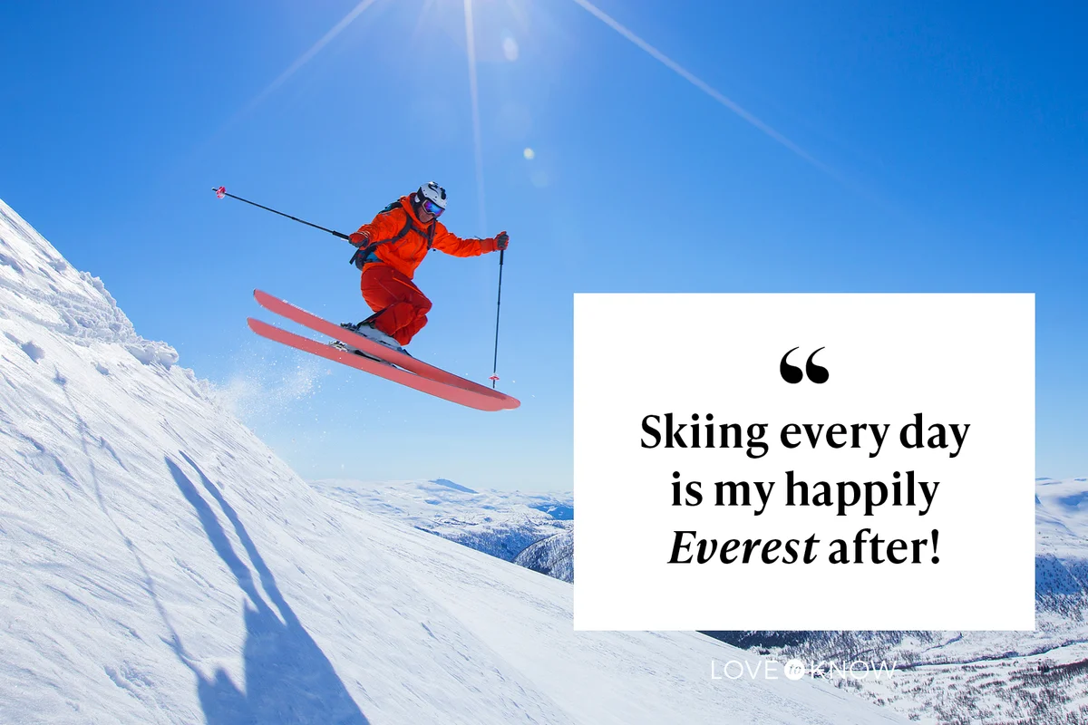A freerider in a red suit is jumping from a snow ridge