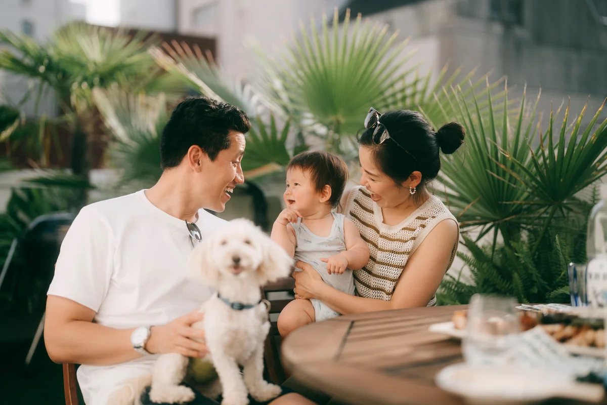 Family with baby and dog