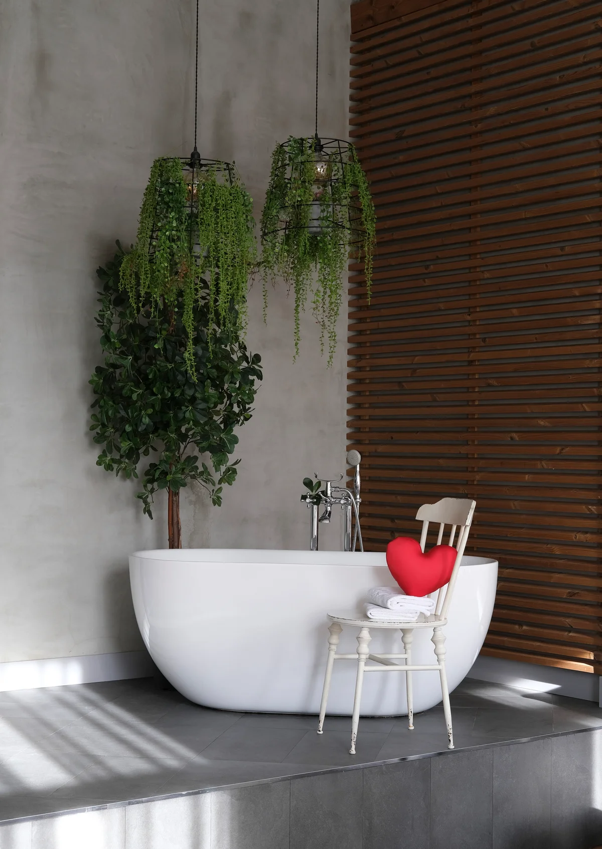 Beautiful hanging plants above bathtub