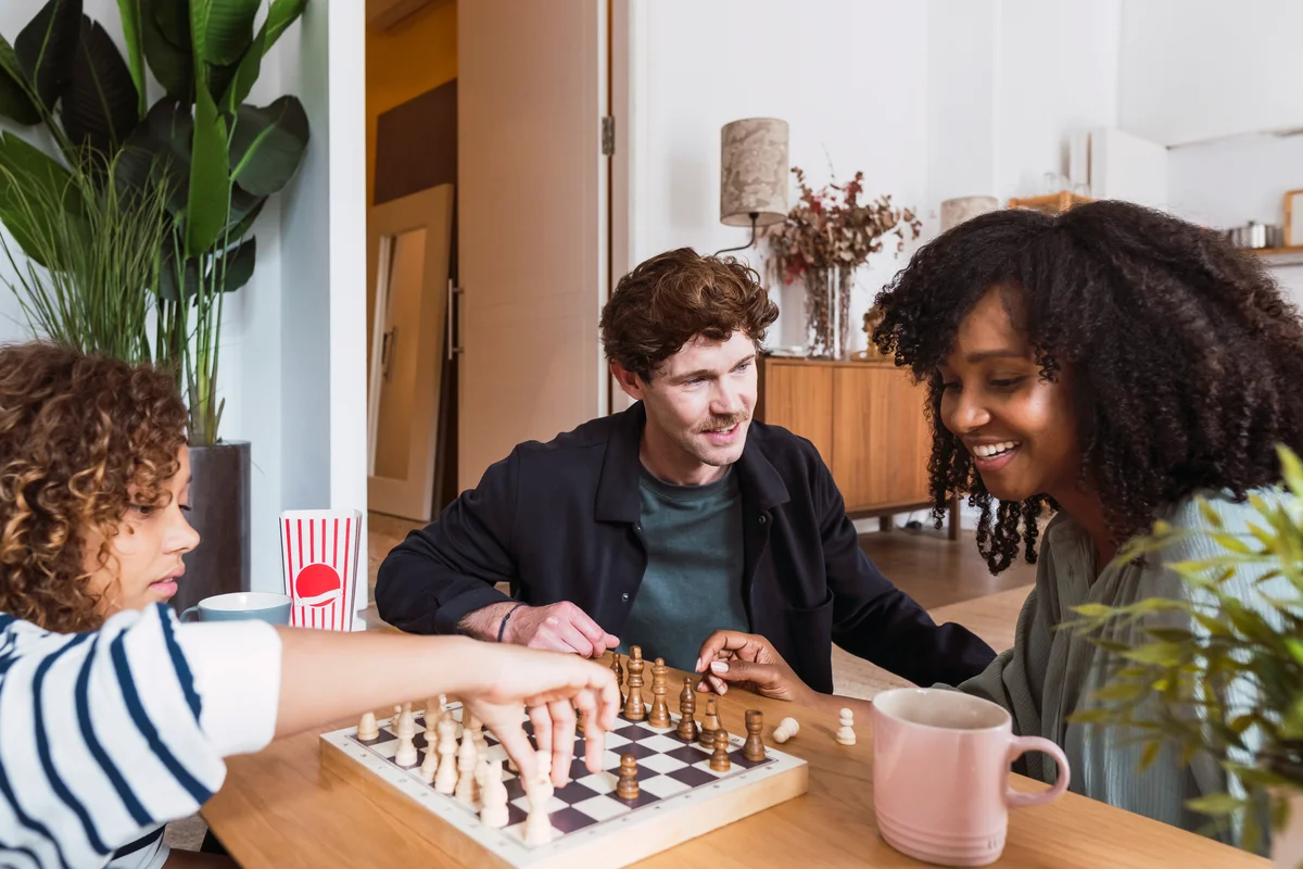 Family playing chess