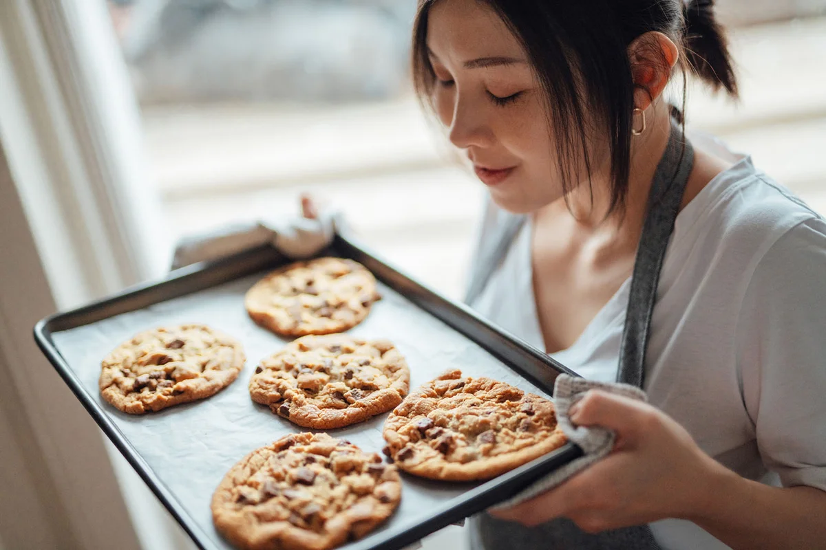 woman baking cookies at home