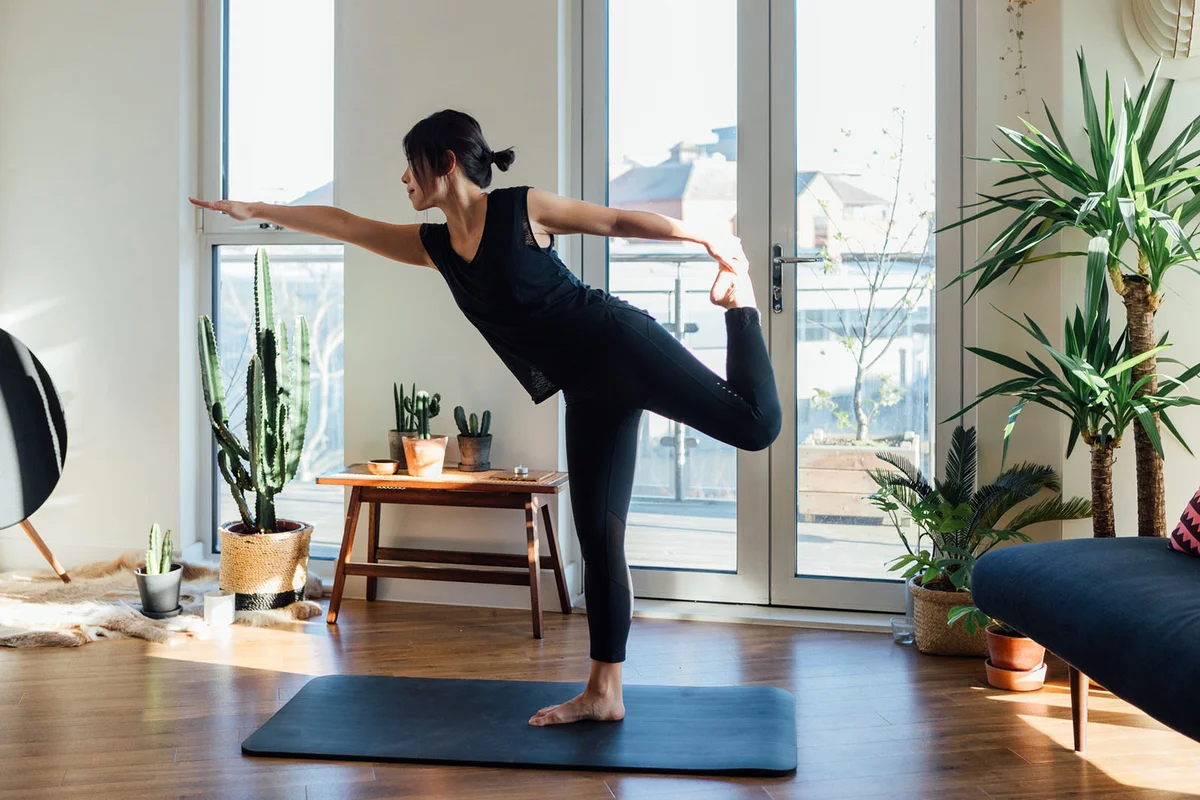 woman doing yoga exercise at home