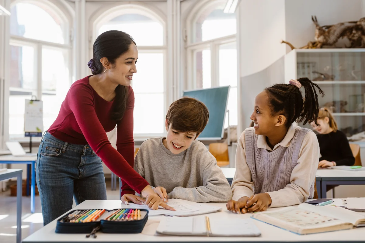 students listening to teacher