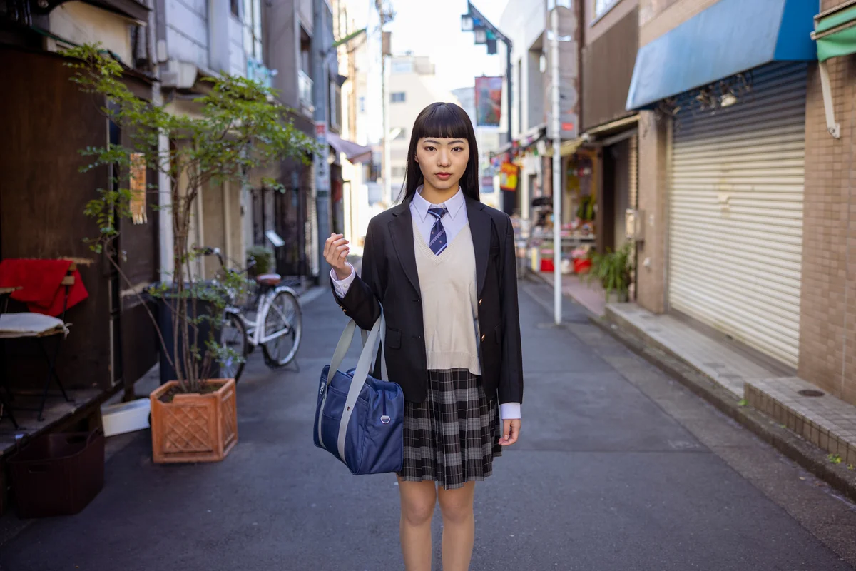 High school student walking in city