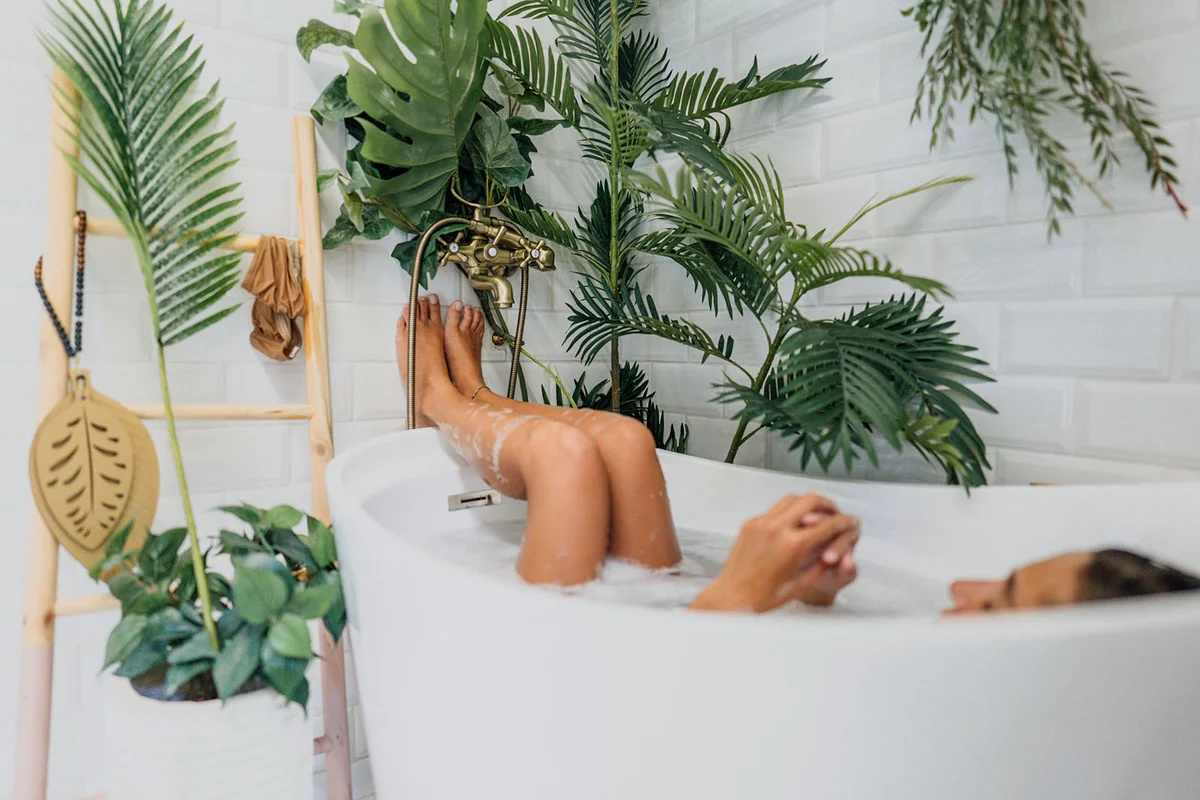 young woman taking a bath