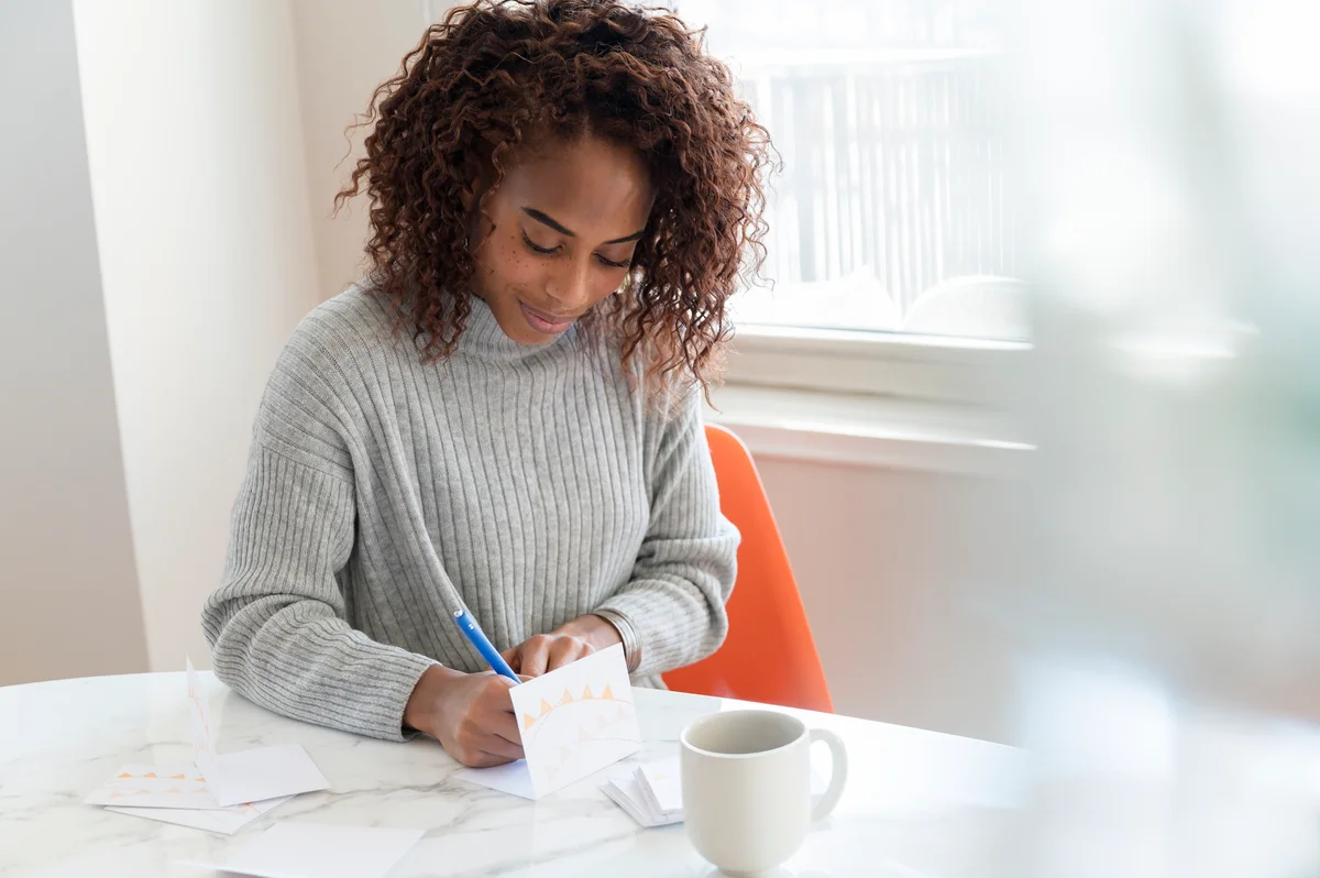 woman writing notes