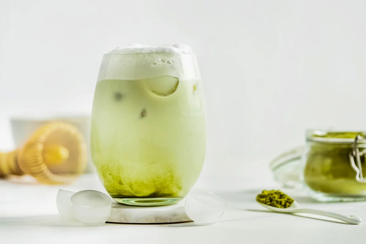 Iced Matcha Latte Tea with whipped cream