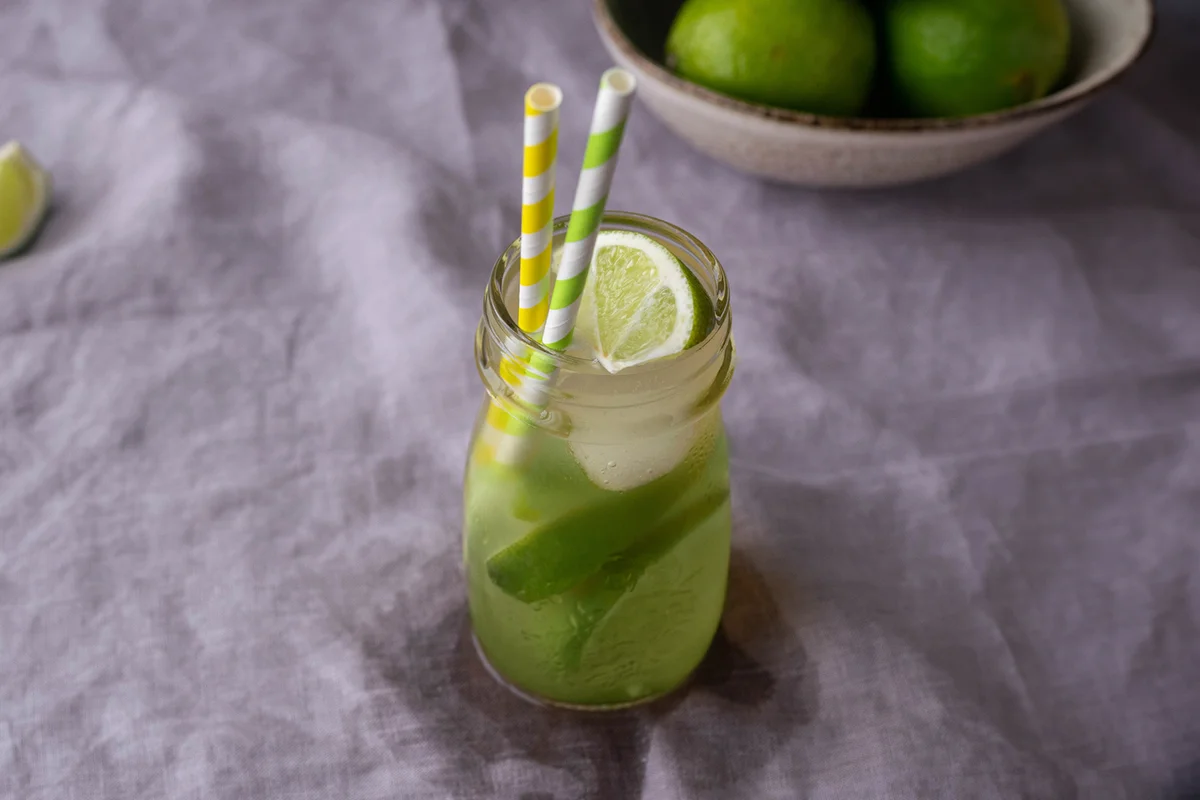 Fresh homemade lemonade drink made with lime fruit