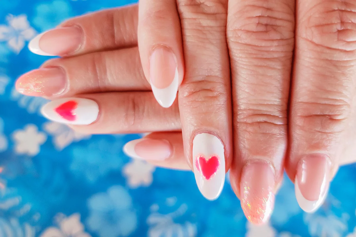 Long Fingernails in Pink color and Heart Shape