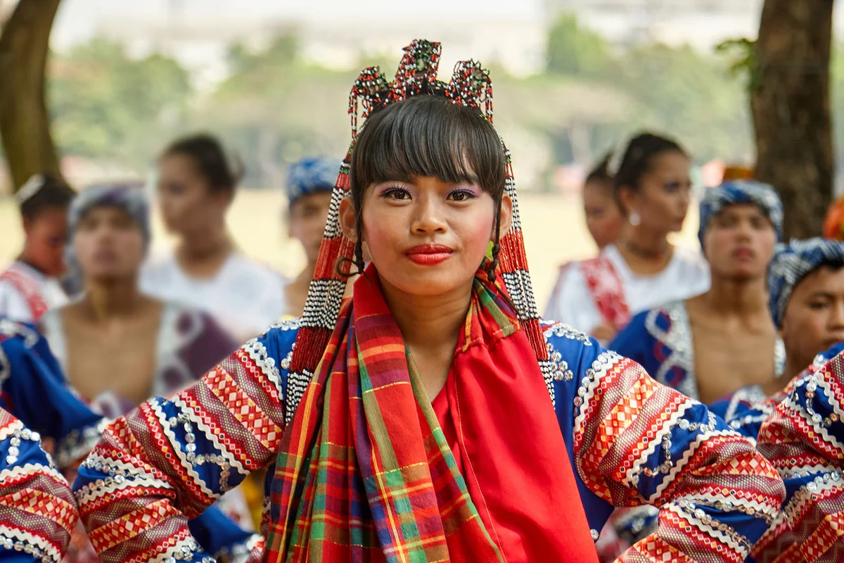 Beautiful filipina wearing a festival costume